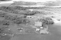 Aerial photograph of a farm in Saskatchewan (39-10-W3)