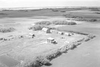 Aerial photograph of a farm in Saskatchewan (39-10-W3)