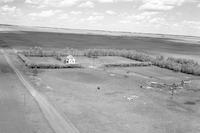 Aerial photograph of a farm in Saskatchewan (40-8-W3)