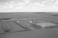 Aerial photograph of a farm in Saskatchewan (40-8-W3)