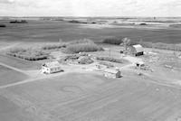 Aerial photograph of a farm in Saskatchewan (26-40-8-W3)