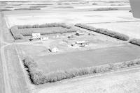 Aerial photograph of a farm in Saskatchewan (40-9-W3)