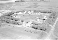 Aerial photograph of a farm in Saskatchewan (21-40-9-W3)
