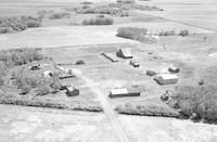 Aerial photograph of a farm in Saskatchewan (21-40-9-W3)
