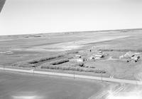 Aerial photograph of a farm in Saskatchewan (40-10-W3)