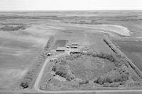 Aerial photograph of a farm in Saskatchewan (40-11-W3)