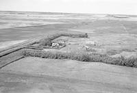 Aerial photograph of a farm in Saskatchewan (36-40-19-W3)
