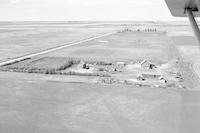 Aerial photograph of a farm in Saskatchewan (41-8-W3)