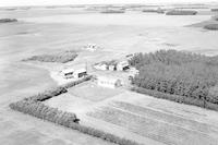 Aerial photograph of a farm in Saskatchewan (35-41-9-W3)