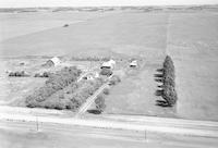 Aerial photograph of a farm near Radisson, SK (41-10-W3)