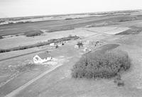 Aerial photograph of a farm in Saskatchewan (41-11-W3)