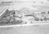 Aerial photograph of a farm in Saskatchewan (1-42-23-W3)