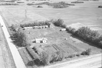 Aerial photograph of a farm in Saskatchewan (43-11-W3)