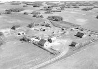 Aerial photograph of a farm in Saskatchewan (24-43-11-W3)