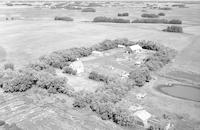 Aerial photograph of a farm in Saskatchewan (43-11-W3)