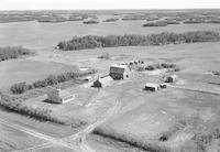 Aerial photograph of a farm in Saskatchewan (46-12-W3)