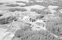 Aerial photograph of a farm in Saskatchewan (10-46-12-W3)