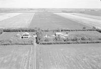 Aerial photograph of a farm in Saskatchewan (42-9-W3)