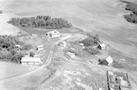 Aerial photograph of a farm in Saskatchewan (6-42-12-W3)