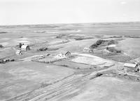 Aerial photograph of a farm in Saskatchewan (28-42-12-W3)