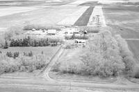 Aerial photograph of a farm in Saskatchewan (16-42-12-W3)