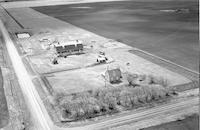 Aerial photograph of a farm in Saskatchewan (30-42-23-W3)