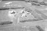 Aerial photograph of a farm in Saskatchewan (20-42-23-W3)