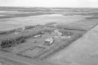 Aerial photograph of a farm in Saskatchewan (24-42-23-W3)