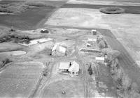 Aerial photograph of a farm in Saskatchewan (24-42-23-W3)