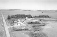 Aerial photograph of a farm in Saskatchewan (14-42-23-W3)