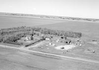 Aerial photograph of a farm in Saskatchewan (10-43-22-W3)