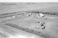 Aerial photograph of a farm in Saskatchewan (10-43-22-W3)