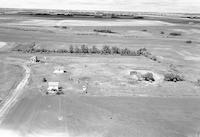 Aerial photograph of a farm near Marcelin, SK (47-2-W3)