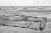 Aerial photograph of a farm in Saskatchewan (47-23-W3)