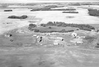 Aerial photograph of a farm in Saskatchewan (22-47-23-W3)
