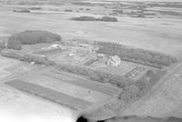 Aerial photograph of a farm in Saskatchewan (47-23-W3)