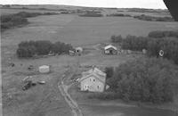 Aerial photograph of a farm in Saskatchewan (48-19-W3)