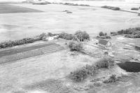 Aerial photograph of a farm in Saskatchewan (31-48-19-W3)