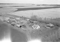 Aerial photograph of a farm near Town of Loon Lake, SK