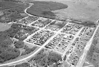 Aerial photograph of a farm near Town of Loon Lake, SK