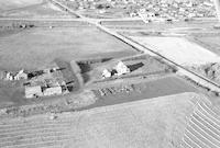 Aerial photograph of a farm in Saskatchewan (47-23-W3)