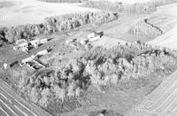 Aerial photograph of a farm in Saskatchewan (47-23-W3)