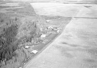 Aerial photograph of a farm near St. Walburg, SK