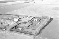 Aerial photograph of a farm in Saskatchewan (34-42-21-W3)