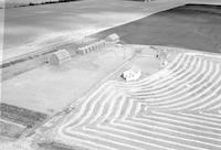 Aerial photograph of a farm near Meadow Lake, SK