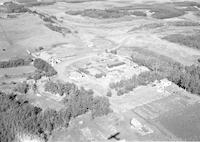 Aerial photograph of a farm near Prince Albert, SK