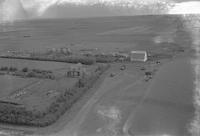 Aerial photograph of a farm near Luseland, SK (24-36-23-W3)