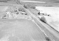 Aerial photograph of a farm near Vawn, SK (48-19-W3)