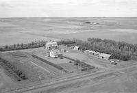 Aerial photograph of a farm in Saskatchewan (21-37-24-W3)