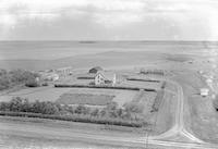 Aerial photograph of a farm in Saskatchewan (22-37-24-W3)